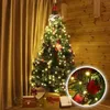 A decorated Christmas tree with gifts underneath, set against a backdrop of curtains and a wooden wall. A close-up inset shows a detail of the tree's lights and ornaments. Produktbild-Vorschau