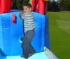 Happy Hop Skákací hrad 8 v 1 play centrum 4m x 2,9m. výška Náhled obrázku produktu 27