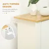 Close-up of a white cabinet with a wooden top, showing an anti-tipping strap attached to the back. Produktbild-Vorschau