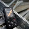 A rugged phone is placed on a metal structure. Podgląd zdjęcia produktu
