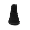 A black boot is shown from the front on a white background. Produktbild-Vorschau