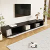 A modern living room with a black TV stand and a wall-mounted TV. Produktbild-Vorschau