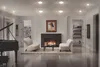 A well-lit living room with a fireplace, piano, and seating area. Produktbild-Vorschau
