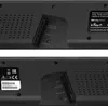 Close-up view of the rear ports and labels of a soundbar. Produktbild-Vorschau
