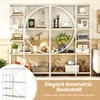 A stylish bookshelf filled with decorative items and books, set in a well-lit room. Produktbild-Vorschau