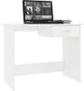 A white desk with a laptop and books on it, against a white background. Podgląd zdjęcia produktu