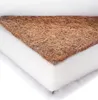 A close-up, cross-section view of a baby mattress, showing its layered construction. Produktbild-Vorschau