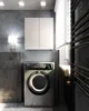 A modern bathroom with a washing machine, a wall-mounted cabinet, and a towel rack. Voir les images du produit