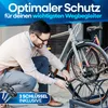 A man is locking his bicycle with a folding lock. Produktbild-Vorschau