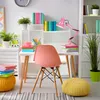 A bright and colorful desk setup for a child or student, featuring a pink desk lamp, books, plants, and a chair. Anteprima dell’immagine prodotto