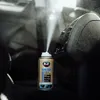 A can of air freshener is spraying into the air inside a car, near the air vents. Náhľad obrázku produktu