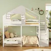 A white bunk bed shaped like a house, decorated for Christmas, in a child's room. Anteprima dell’immagine prodotto
