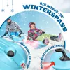 Two people sledding down a snowy hill, with close-ups of the sled's features. Produktbild-Vorschau