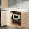 A modern kitchen cabinet with an open door revealing a microwave on a pull-out shelf. There are wooden drawers to the right and a tiled backsplash above. Podgląd zdjęcia produktu
