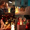 A collage of four images showing a bunny-shaped night light in different settings with children and families. Produktbild-Vorschau