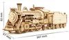 A 3D wooden model of a steam train with dimensions indicated. Podgląd zdjęcia produktu