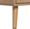 A close-up of a wooden leg of a piece of furniture. Podgląd zdjęcia produktu