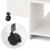 A close-up view of a white furniture piece with black casters, showing the attachment mechanism. Voir les images du produit