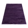 A purple shaggy rug is shown from a slightly elevated angle against a white background. Anteprima dell’immagine prodotto