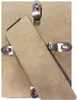 The back of a picture frame with metal clips holding a backing board in place. Produktbild-Vorschau