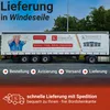 A truck trailer with advertising for a fuel delivery service. Produktbild-Vorschau