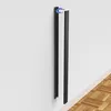 A black metal cable channel mounted on a white wall, with a blue hook at the top. Anteprima dell’immagine prodotto