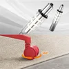 A split image showing the internal mechanism of a gas lift cylinder and a close-up of a red office chair caster on a carpet. Produktbild-Vorschau