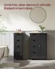 A bathroom scene with two black storage cabinets, a mirror, and a bathtub. Produktbild-Vorschau