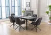 A dining room setting with a table and chairs. Produktbild-Vorschau