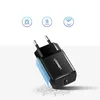 A black Ugreen USB wall charger is shown against a white and light gray background with marketing icons above it. Anteprima dell’immagine prodotto