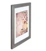 A framed picture of a woman adorned with flowers. Produktbild-Vorschau