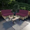 An outdoor patio scene with pallet furniture and a coffee table. Produktbild-Vorschau