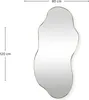 A single, organically shaped mirror with a gold frame is shown against a white background. Dimensions are indicated with text and lines. Náhľad obrázku produktu