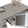 A close-up view of a vanity table with an open drawer revealing makeup and a lit mirror. Produktbild-Vorschau