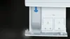 A close-up view of a washing machine's detergent dispenser drawer. Produktbild-Vorschau