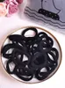 50 pezzi di elastici per capelli neri semplici Anteprima dell’immagine prodotto 7