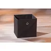 A black fabric storage box sits on a wooden floor. Produktbild-Vorschau