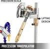 Close-up of a precision manipulator and a precision scale on a white background. Anteprima dell’immagine prodotto