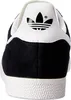 The back view of a black Adidas Gazelle sneaker with a white heel tab featuring the Adidas logo. Produktbild-Vorschau