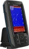A Garmin fishfinder device is shown in a studio setting, angled to display its screen and controls. Náhled obrázku produktu