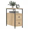 A bedside table with two drawers and an open shelf, topped with a vase of greenery and an alarm clock. Náhled obrázku produktu