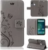 A collage of images showing a grey flip phone case with a floral and butterfly design, including views of the case open, closed, and from the side. Produktbild-Vorschau