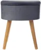 A gray velvet ottoman with wooden legs, shown against a white background. Podgląd zdjęcia produktu