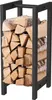 A black metal firewood rack filled with logs, presented against a white background. Anteprima dell’immagine prodotto