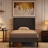 A bedroom scene with a bed, artwork, and a nightstand. Anteprima dell’immagine prodotto