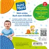 The image shows the back of a children's book with illustrations and text describing its features. It includes a baby and a toddler playing with the book. Produktbild-Vorschau