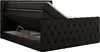 A black upholstered boxspring bed with the storage compartment open, showing the internal frame and lifting mechanism. Produktbild-Vorschau