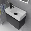 A modern bathroom vanity with a sink and faucet. Produktbild-Vorschau