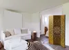 A room divider is placed in a living room setting. Náhľad obrázku produktu