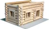 A model of a log cabin made from wooden blocks, sitting on a gray surface. Anteprima dell’immagine prodotto